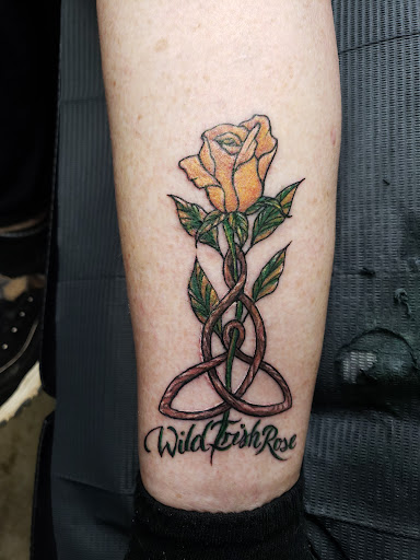 Explore nike tattoo ideas, creative tattoo ideas in Frederick, available at Blue Crab Tattoo & Body Piercing