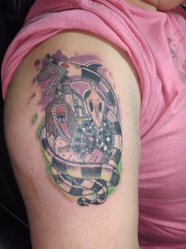 Explore side hand tattoo ideas, creative tattoo ideas in Kewanee, available at Splat Ink tattoos and piercings
