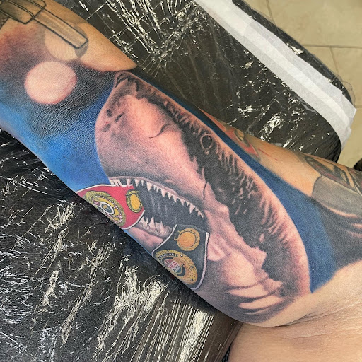 Explore rock music tattoo ideas, creative tattoo ideas in Passaic, available at District 36 Tattoo Parlor