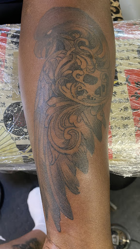 Explore manatee tattoo ideas, creative tattoo ideas in Hamilton, available at Tattoo Club