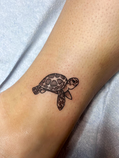 Explore jade tattoo ideas, creative tattoo ideas in Charleston, available at The Edge Tattoo Studio