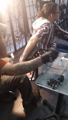 Explore evil dead tattoo ideas, creative tattoo ideas in Fayetteville, available at Evolution Ink Tattoo and Piercing Studio