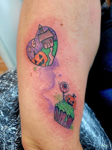 Explore cute dog tattoos ideas, creative tattoo ideas in Benton, available at Spectrum Tattoo