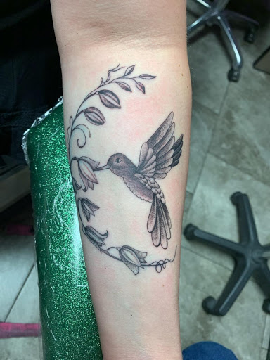 Explore kayak tattoo ideas, creative tattoo ideas in Idaho Falls, available at Spiders Web