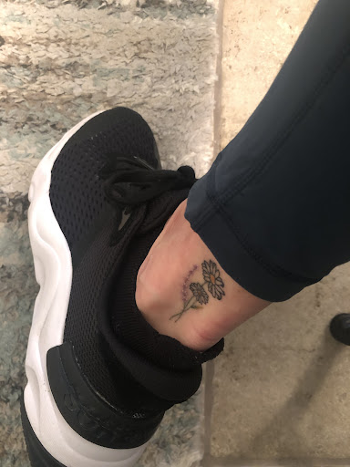 Explore tattoo ideas with flowers and names, creative tattoo ideas in San Diego, available at Sideshow Tattoo and Piercing