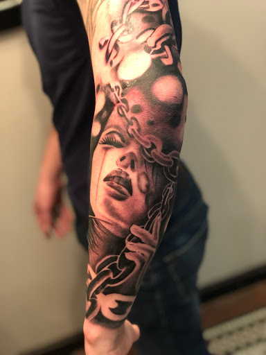 Explore hand tattoo ideas male, creative tattoo ideas in Junction City, available at Junction City Tattoo