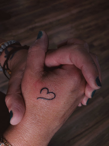 Explore women's cover up tattoo ideas, creative tattoo ideas in North Tonawanda, available at Dark Side Ink Tattoo Studio