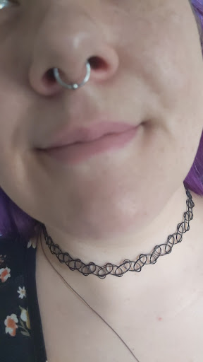 Explore throat tattoo ideas, creative tattoo ideas in Norman, available at Poke Body Piercing