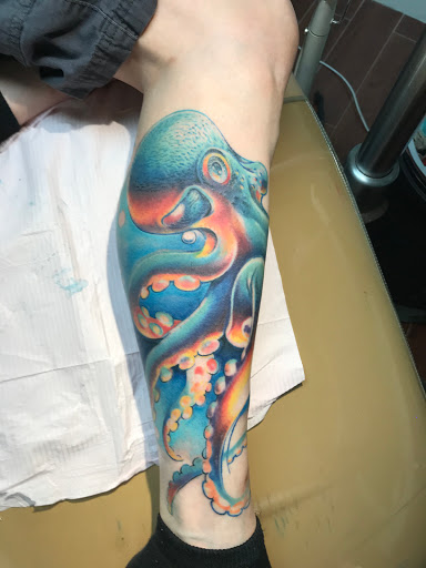 Explore tattoo on thigh ideas, creative tattoo ideas in Center Line, available at Elite Ink Tattoo Studios