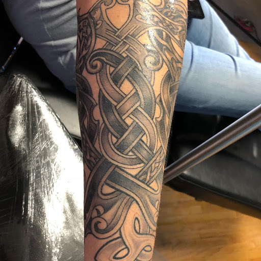 Explore song tattoo ideas, creative tattoo ideas in Elk River, available at Subjective Art Tattoo, LLC