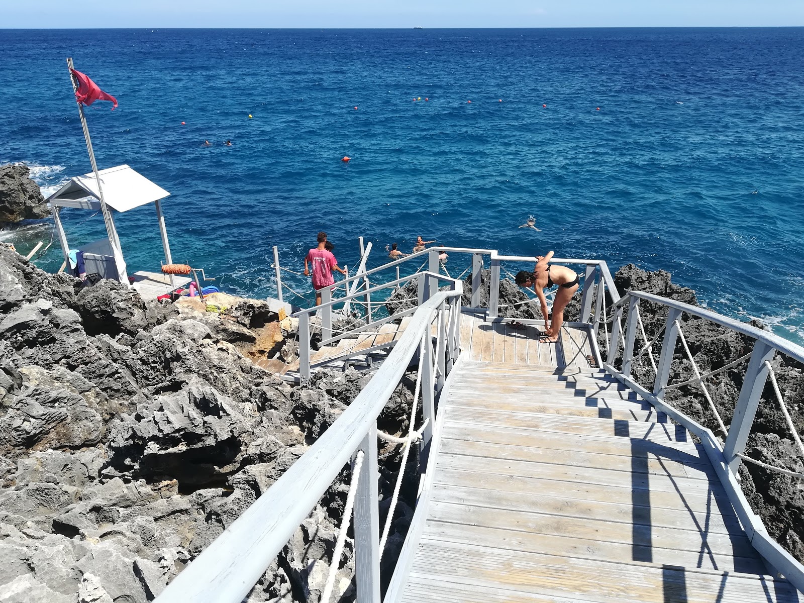 Photo de Spiaggia dei Porticelli partiellement zone de villégiature