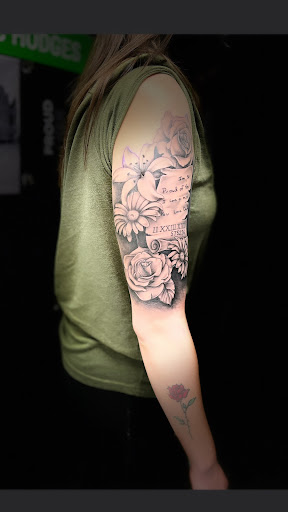 Explore hawk tattoo ideas for females, creative tattoo ideas in Cadillac, available at Limitless Ink Tattoo Studio