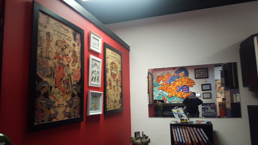 Tattoo Shop «Magnum Tattooing», reviews and photos, 2317 Division Ave S, Grand Rapids, MI 49507, USA