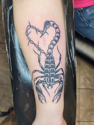 Explore watercolor tattoo ideas for females, creative tattoo ideas in Muskogee, available at J & G Tattoo & Body Piercing