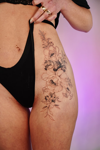 Explore feminine cross tattoo ideas, creative tattoo ideas in Portland, available at Midnight Tattoo