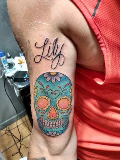 Explore half and half tattoo ideas, creative tattoo ideas in Taos, available at Muerte Tattoo Taos