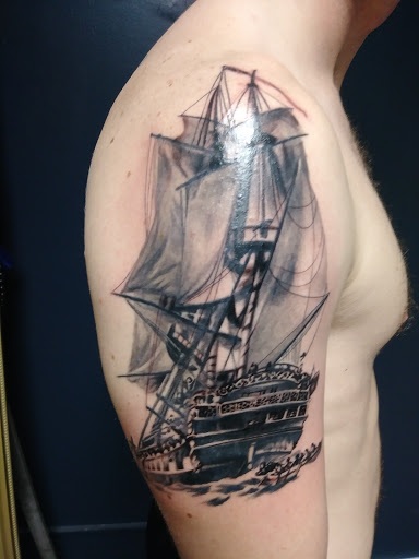 Explore let go let god tattoo ideas, creative tattoo ideas in Chapel Hill, available at Golden Falcon Tattoo and Piercing