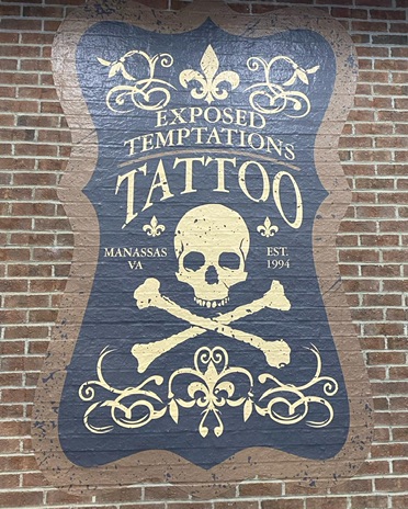Explore doom tattoo ideas, creative tattoo ideas in Manassas, available at Exposed Temptations Tattoo