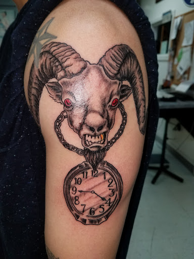 Explore pizza tattoo ideas, creative tattoo ideas in Libertyville, available at Art With Atattooed