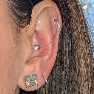 Explore dahlia tattoo ideas, creative tattoo ideas in Minocqua, available at Lotus Piercing