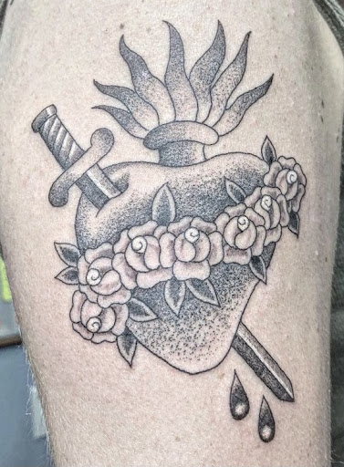 Explore flower tattoo ideas on arm, creative tattoo ideas in Boston, available at Good Faith Tattoos