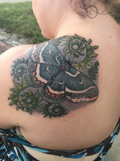 Explore august birth flower tattoo ideas, creative tattoo ideas in Girard, available at Empress Tattoos FKA Treehouse Tattoo