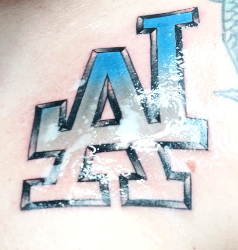 Explore small face tattoo ideas male, creative tattoo ideas in Fort Myers, available at Loyal 2 The Coil Tattoos & Piercings (Edison Mall Location Entrance F)