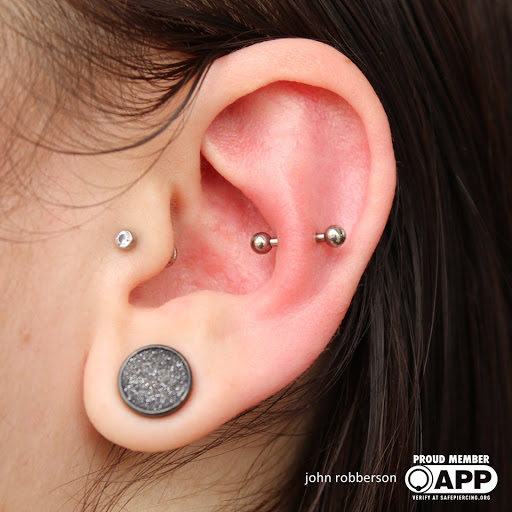 Explore acoustic guitar tattoo ideas, creative tattoo ideas in Fort Myers, available at Tiger Lotus Tattoo and Piercing