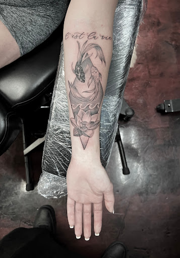 Explore hunger games tattoo ideas, creative tattoo ideas in Silver City, available at Independent Ink Tattoo