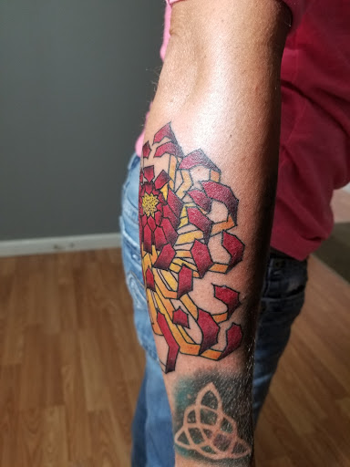 Explore skiing tattoo ideas, creative tattoo ideas in Marion, available at Eternal Art Tattooing