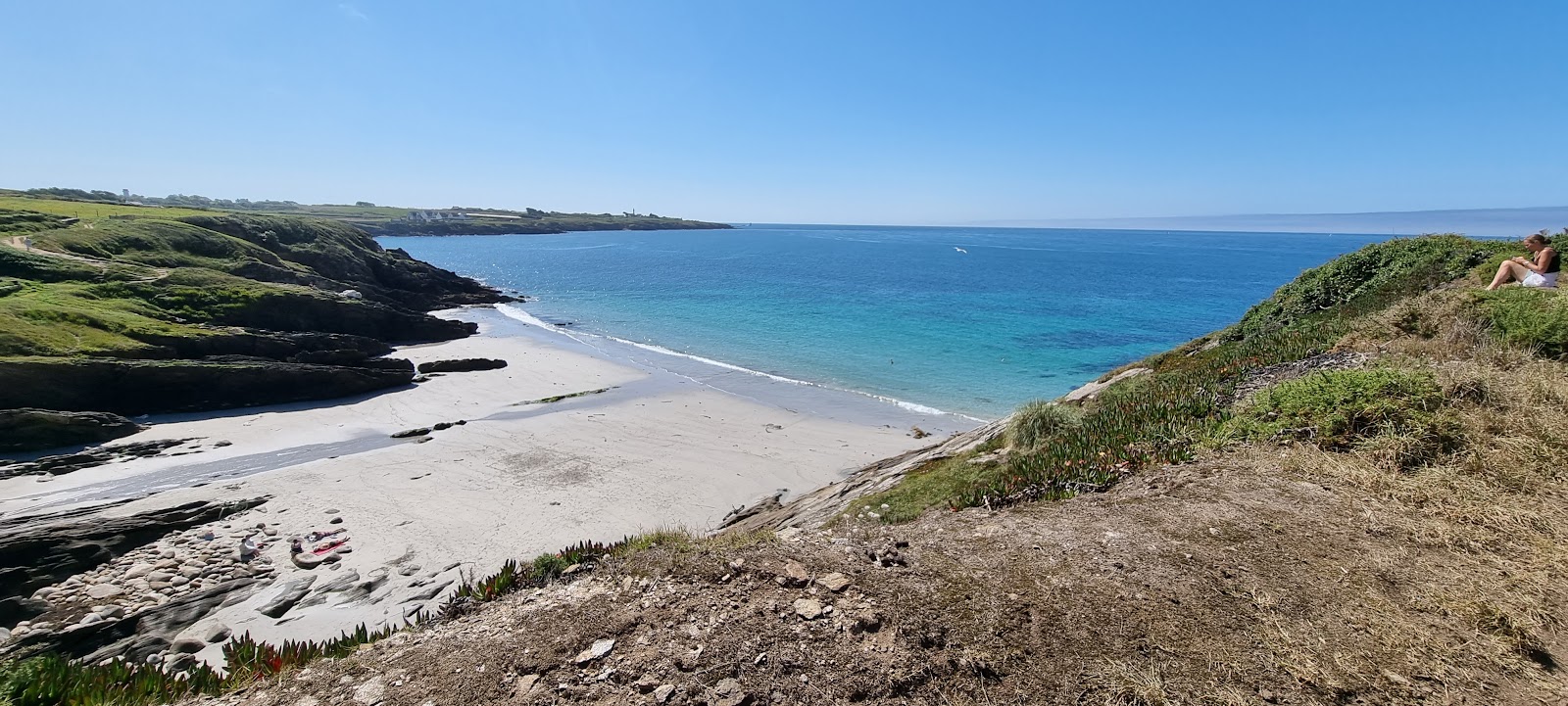 Foto di Plage du Bilou con una superficie del sabbia beige