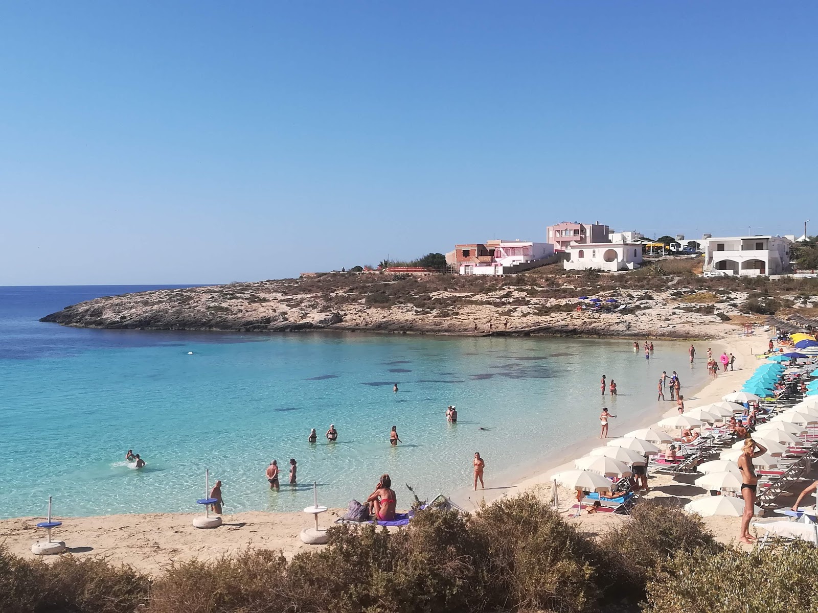 Fotografija Spiaggia della Guitgia z svetel fin pesek površino