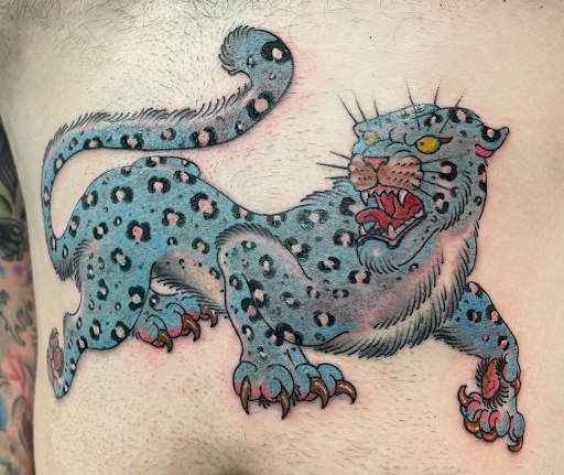 Explore dog collar tattoo ideas, creative tattoo ideas in Yakima, available at Top Kat Tattoo