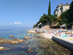 Javna beach'in fotoğrafı birden fazla geniş koy ile birlikte