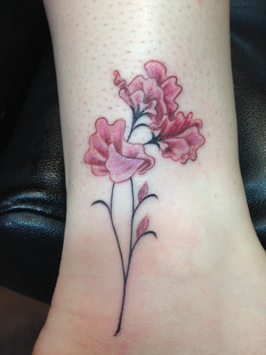 Explore tattoo ideas for black males, creative tattoo ideas in Sedona, available at Physical Graffiti Tattoo