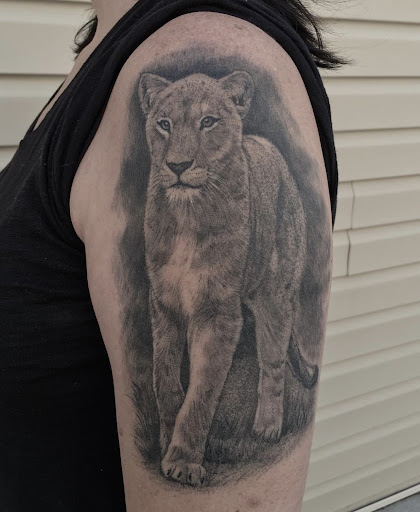 Explore inner bicep tattoo ideas, creative tattoo ideas in Harrisonburg, available at Mr Lucky Tattoo