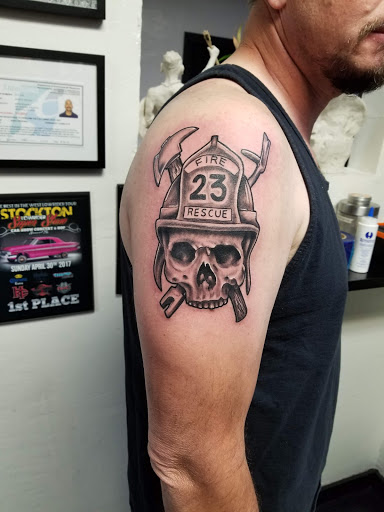 Explore book tattoo ideas small, creative tattoo ideas in Modesto, available at Ink Disciples Tattoo Parlor