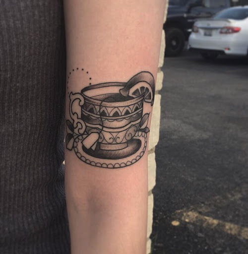Explore dental tattoo ideas, creative tattoo ideas in Mchenry, available at Art and Soul Tattoo Company