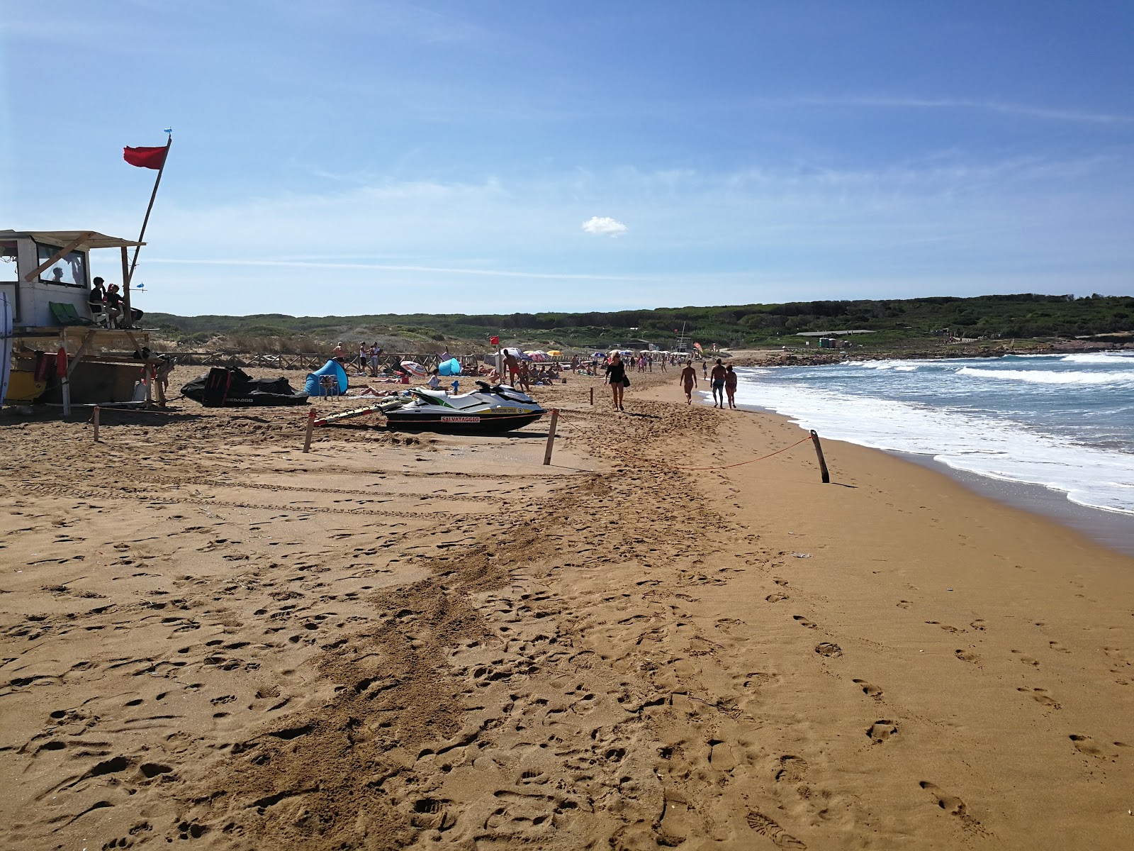 Fotografija Spiaggia di Porto Ferro z turkizna čista voda površino