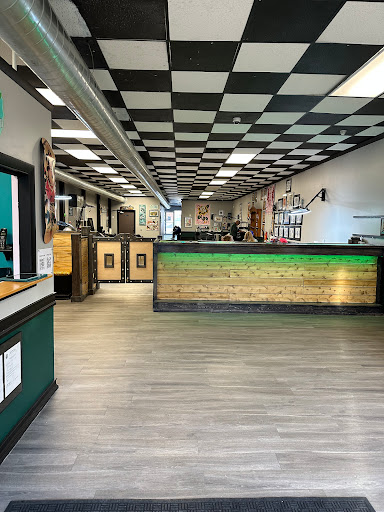 Explore tattoo cover up ideas on forearm, creative tattoo ideas in Manchester, available at Electric Avenue Tattoos