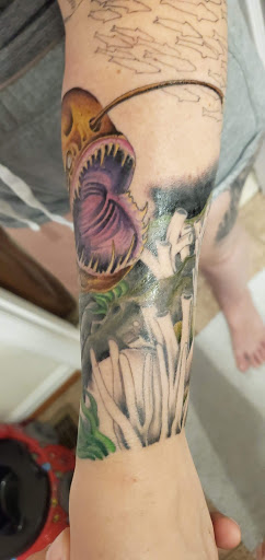 Explore tattoo cover up ideas for guys, creative tattoo ideas in Washington, available at Tattoo Paradise