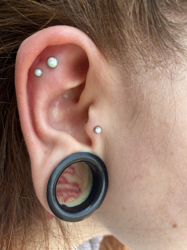 Explore shoulder tattoo ideas for men, creative tattoo ideas in Houston, available at Body Art Piercing Studio
