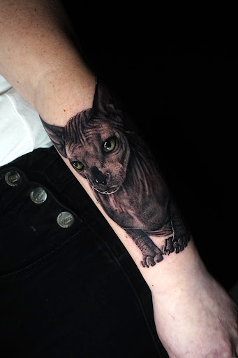 Explore middle arm tattoo ideas, creative tattoo ideas in New York, available at Red Baron Ink Tattoo and Piercing