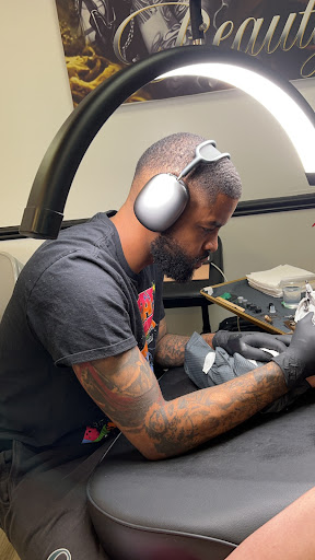 Explore child tattoo ideas, creative tattoo ideas in Milwaukee, available at Beauty is Pain Tattoo and Body Piercings