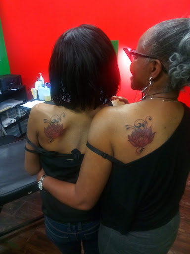 Explore ear tattoo ideas for females, creative tattoo ideas in Mobile, available at Brothers Ink Tattoo Parlor