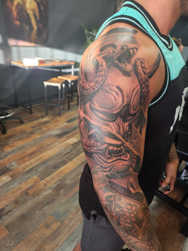 Explore american sleeve tattoo ideas, creative tattoo ideas in Aurora, available at Aurora Tattoo Company
