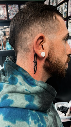 Explore candyman tattoo ideas, creative tattoo ideas in West Hartford, available at Shamrock Tattoo Company