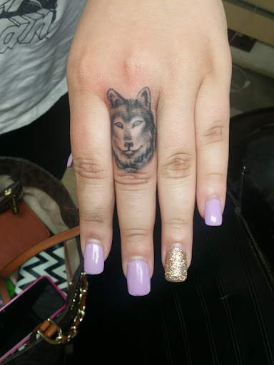 Explore unique knee tattoo ideas, creative tattoo ideas in Plainfield, available at Tattoo Warehouse AND Body Piercings