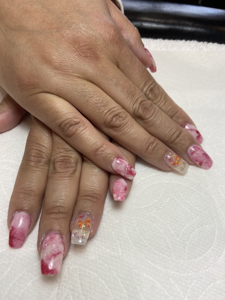 Golden Nails and Tanning 86323