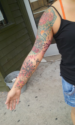 Explore lit tattoo ideas, creative tattoo ideas in Warren, available at Aces Tattoo & Body Piercing